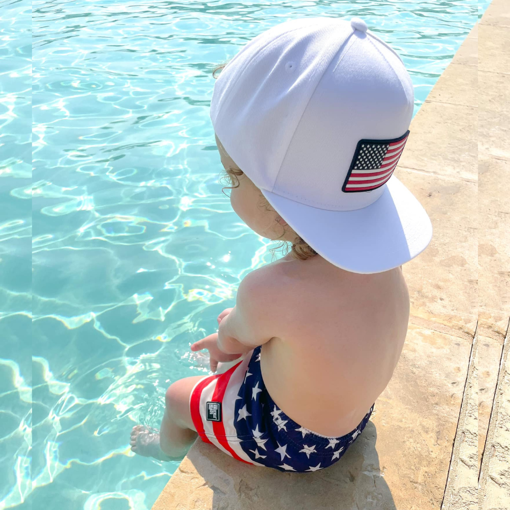 Discover the 'USA Flag Swimmies' for kids, a fantastic blend of style and patriotism! With a sleek design inspired by the American flag, these swim floaties offer a secure fit for worry-free water play. Watch your child exude confidence and enjoy their time in the pool or at the beach, proudly showcasing their love for the country. The 'USA Flag Swimmies' are the perfect companions for a summer filled with memorable and safe aquatic adventures.