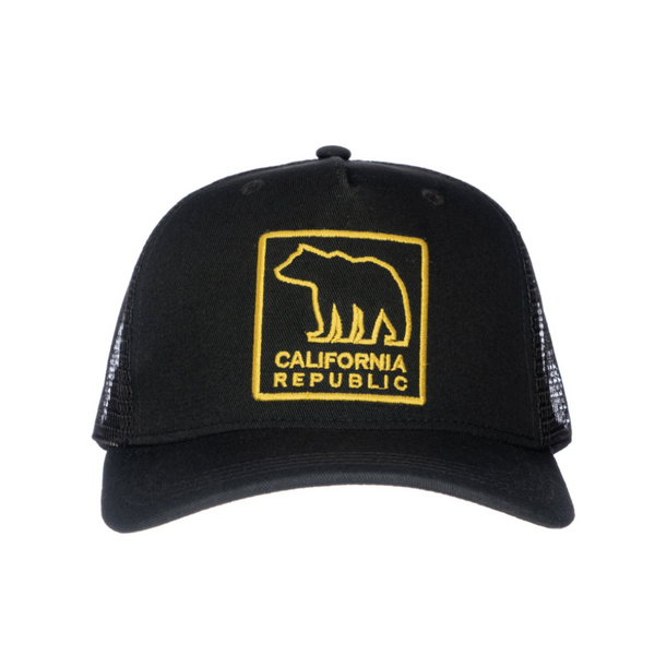 Image of Black Kids Trucker Hat with Gold California Republic Patch: A stylish and captivating accessory designed for kids. In sleek black, it showcases a striking gold California Republic patch on the front. Elevate your child's style with this fashionable hat, perfect for expressing their affinity for the Golden State. Crafted with care, this black kids trucker hat with the gold California Republic patch is a must-have addition to their wardrobe, suitable for various occasions and everyday wear.