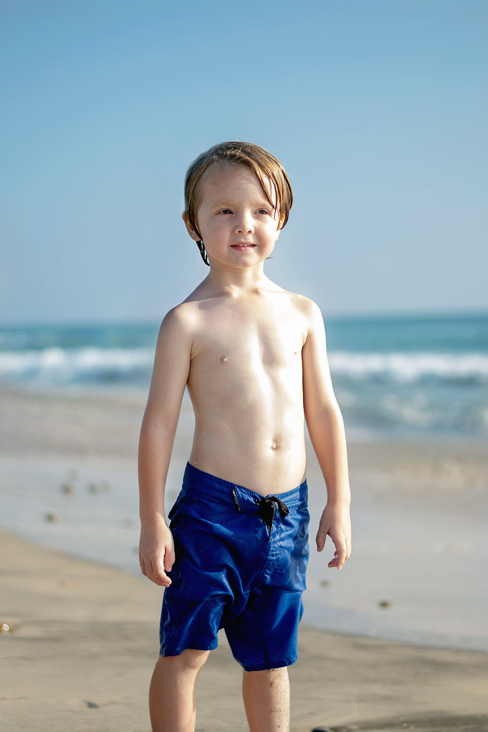 Introducing our cool and versatile 'Blue Shorts' for kids - a must-have addition to their summer wardrobe! These stylish shorts feature a timeless blue hue, perfect for various water activities. Available in sizes for kids aged 6 months to 5 years, the 'Blue Shorts' offer a comfortable fit, allowing young ones to move freely and enjoy the beach or pool to the fullest.