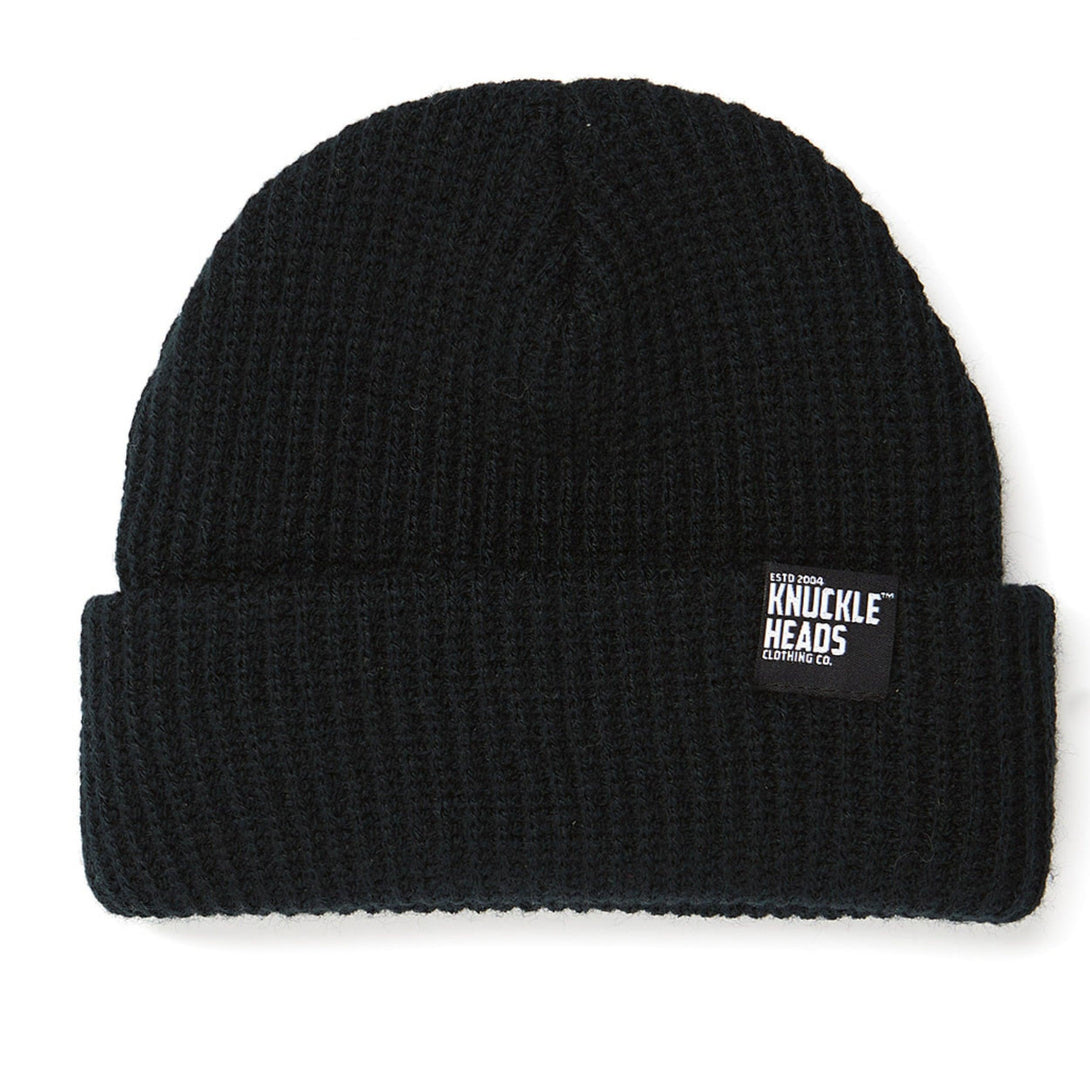 Image of Black Kids Beanie with Knuckleheads Logo: A stylish and cozy accessory for kids. In a charming green color, it features the iconic Knuckleheads logo on the front. Elevate your child's style with this fashionable beanie, perfect for adding a touch of character to their outfits while keeping them warm.
