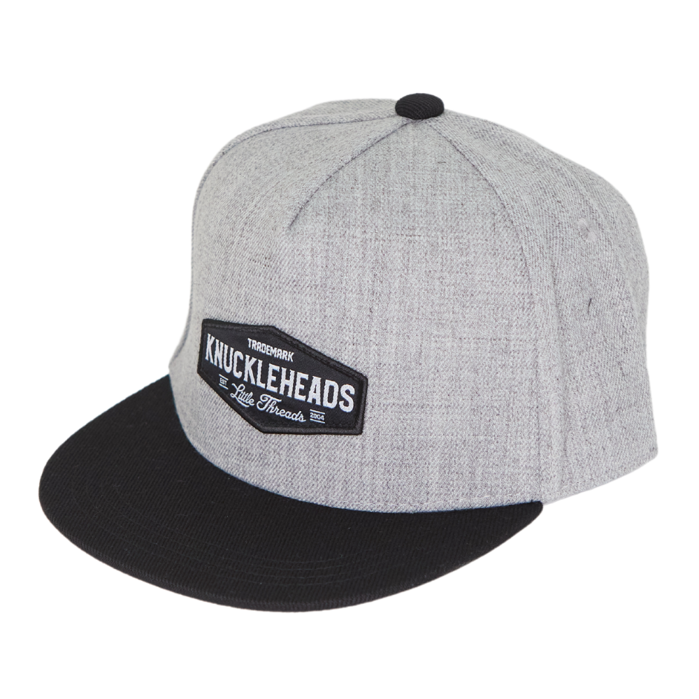 Image of Black and Grey Kids Trucker Hat with Knuckleheads Patch: A trendy and versatile accessory designed for kids. Combining sleek black and cool grey tones, it features a striking Knuckleheads patch on the front. Elevate your child's style with this fashionable hat, perfect for adding a touch of edgy flair to their outfits. 