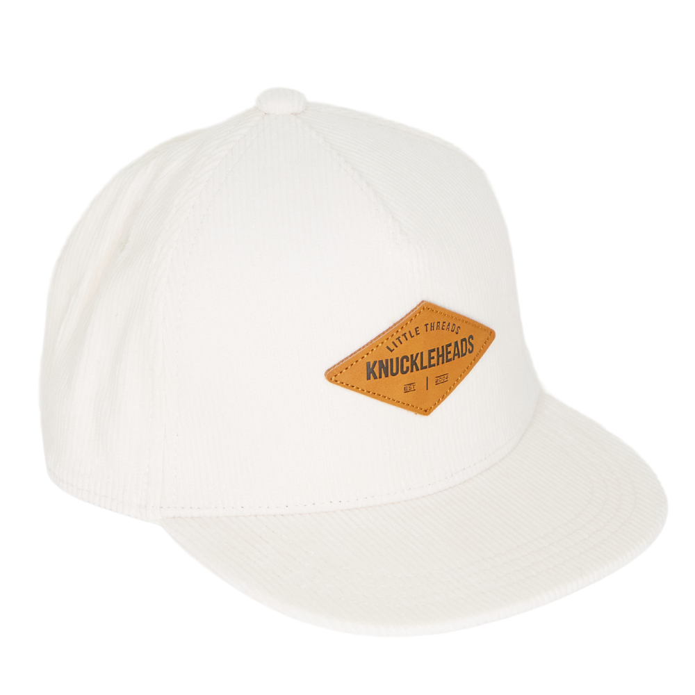 Image of White Corduroy Kids Trucker Hat with Knuckleheads Patch: A stylish and trendy trucker hat designed for kids. The hat comes in crisp white corduroy, featuring a cool Knuckleheads patch on the front. Elevate your child's style with this fashionable and comfortable accessory, perfect for any outing or everyday wear. Crafted with care, this white corduroy trucker hat with a Knuckleheads patch is a must-have addition to their wardrobe.