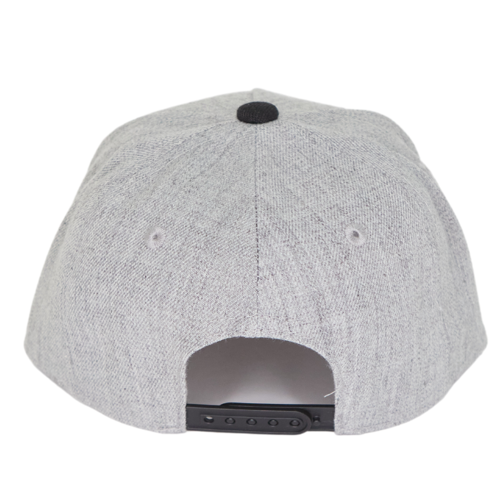 Image of Black and Grey Kids Trucker Hat with 'Bubba' Patch: A versatile and stylish accessory designed for kids. Combining black and grey hues, it features a playful 'Bubba' patch on the front. Elevate your child's style with this fashionable hat, perfect for adding a touch of contrast to their outfits. Crafted with care, this kids trucker hat with the 'Bubba' patch is a must-have addition to their wardrobe, suitable for various occasions and everyday wear.