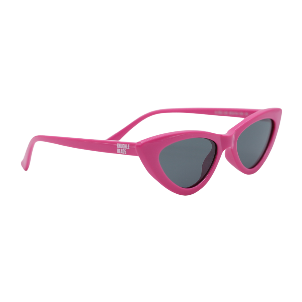 Elevate your child's style with our Kat Sunglasses For Kids, featuring a Pink finish and iconic Knuckleheads logo on the temples. With excellent quality and UV protection, they're delivered in a fabric pouch for added convenience.