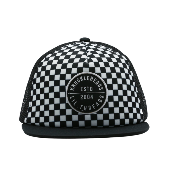 Image of Black and White Checkered Kids Trucker Hat with Knuckleheads Patch: A cool and stylish trucker hat designed for kids. The hat features a trendy black and white checkered pattern, adorned with a striking Knuckleheads patch on the front. Elevate your child's style with this fashionable and eye-catching accessory, perfect for any adventure or everyday wear. Crafted with care, this black and white checkered trucker hat with a Knuckleheads patch is a must-have addition to their wardrobe.