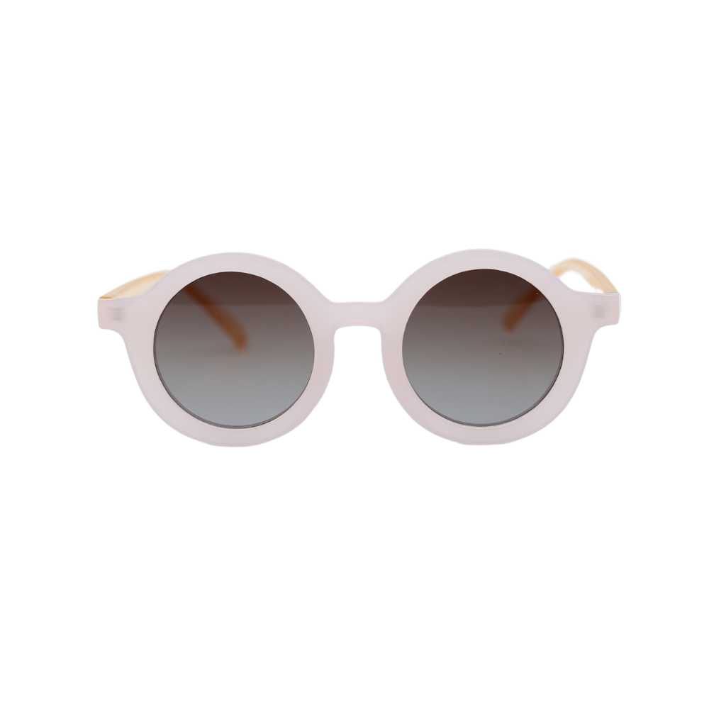 The Ava sunglasses with a redesigned frame, Pink and Golden finish. The lenses have a captivating blackish tint.