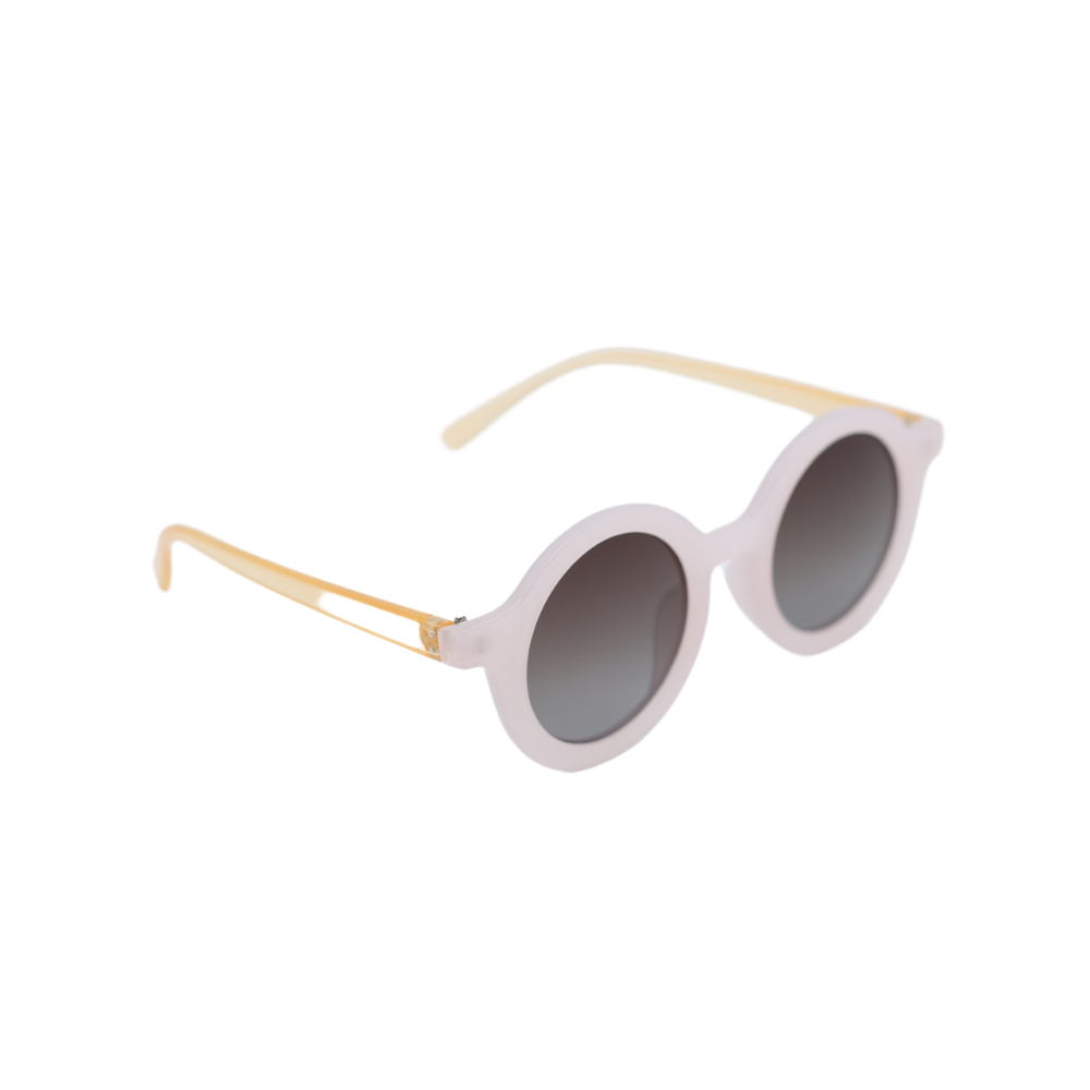 The Ava sunglasses with a redesigned frame, Pink and Golden finish. The lenses have a captivating blackish tint.