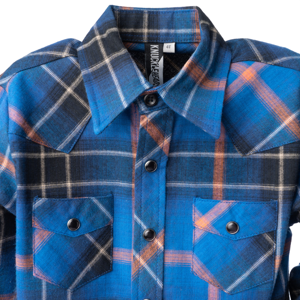 Image: Embrace the vibrant charm of our Blue Highland Button Down Long Sleeve Shirt for children in a captivating teal hue. This timeless and stylish shirt, skillfully crafted from premium, breathable cotton fabric, guarantees your little one comfort and versatility for a wide range of occasions, making it the ideal addition to their wardrobe.