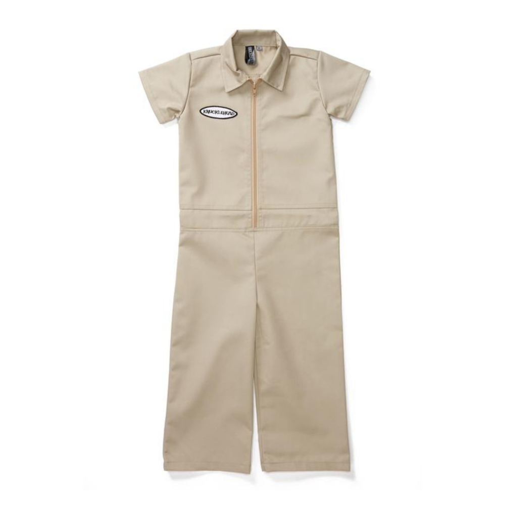 Adorable kids' tan mechanic coveralls, complete with a charming Knuckleheads patch on the chest, making them a fun and stylish choice for your little one's wardrobe. These coveralls are designed to keep your child comfortable and ready for any adventure, whether they're playing in the yard or helping out in the garage. With their durable construction and playful design, these coveralls are sure to become a favorite for both kids and parents alike!
