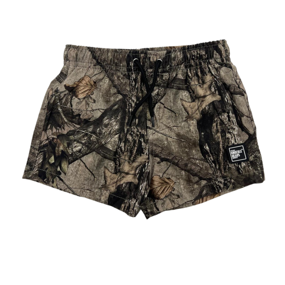 Kids woodland camouflage swim shorts with elastic waistband drawstring and Knuckleheads logo front view