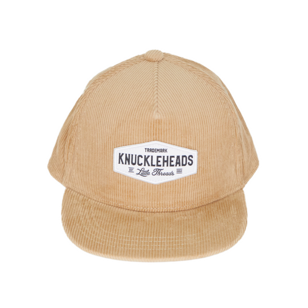 Image of Tan Corduroy Kids Trucker Hat with Knuckleheads Patch: A vintage-inspired and stylish accessory designed for kids. In a warm tan corduroy fabric, it showcases a striking Knuckleheads patch on the front. Elevate your child's style with this fashionable hat, perfect for adding a touch of texture to their outfits.