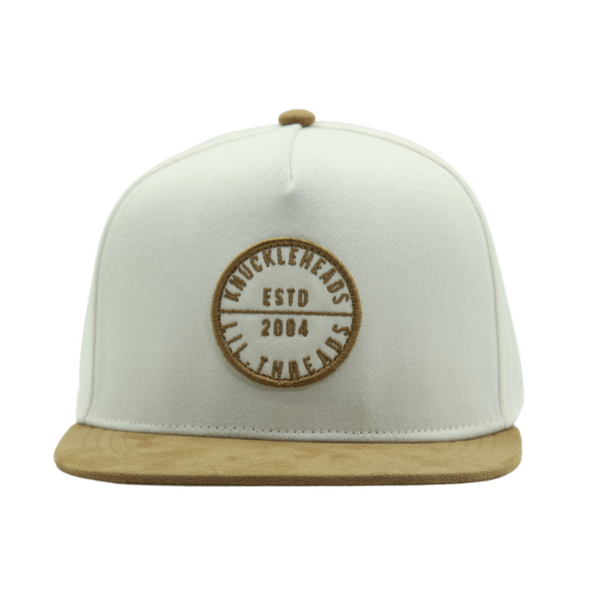Introducing an Off-White Kids Trucker Hat adorned with a classic Knuckleheads patch. Designed for children, this hat combines the versatile off-white hue with the iconic Knuckleheads patch. A standout accessory in our collection, it adds a touch of style and personality to your little one's look.
