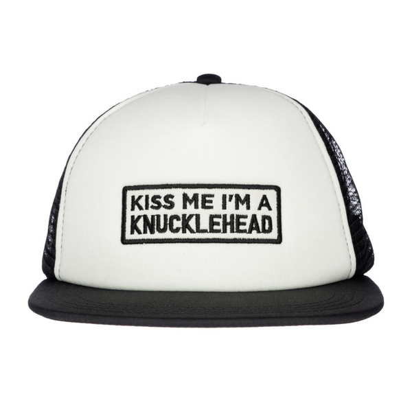 Image of White Kids Trucker Hat with Black Mesh and Knuckleheads Patch: A sleek and stylish accessory designed for kids. In fresh white with black mesh, it showcases a striking Knuckleheads patch on the front. Elevate your child's style with this fashionable hat, perfect for adding a touch of contrast to their outfits while ensuring breathability.