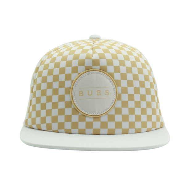 Image of Tan and White Checkers Kids Trucker Hat with 'Bubs' Patch: A versatile and stylish accessory designed for kids. Combining tan and white hues, it features a playful 'Bubs' patch on the front. Elevate your child's style with this fashionable hat, perfect for adding a touch of contrast to their outfits. Crafted with care, this kids trucker hat with the 'Bubba' patch is a must-have addition to their wardrobe, suitable for various occasions and everyday wear.