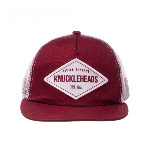 Image of Burgundy Kids Trucker Hat with Knuckleheads Patch: A sophisticated and stylish accessory designed for kids. In rich burgundy, it showcases a striking Knuckleheads patch on the front. Elevate your child's style with this fashionable hat, perfect for adding a touch of elegance to their outfits. Crafted with care, this burgundy kids trucker hat with the Knuckleheads patch is a must-have addition to their wardrobe, suitable for various occasions and everyday wear.