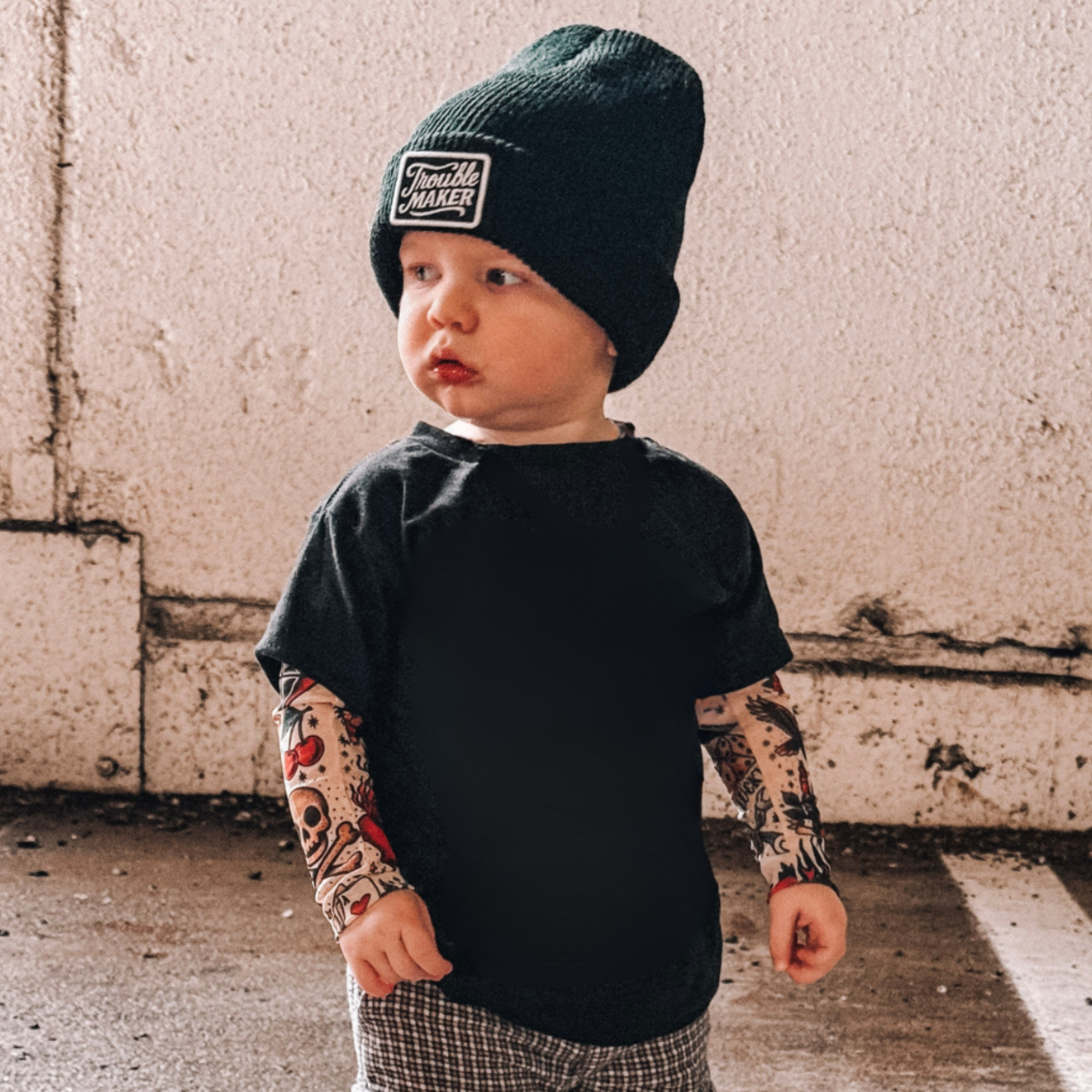 Knuckleheads infant and toddler arm sleeves featuring classic tattoo artwork