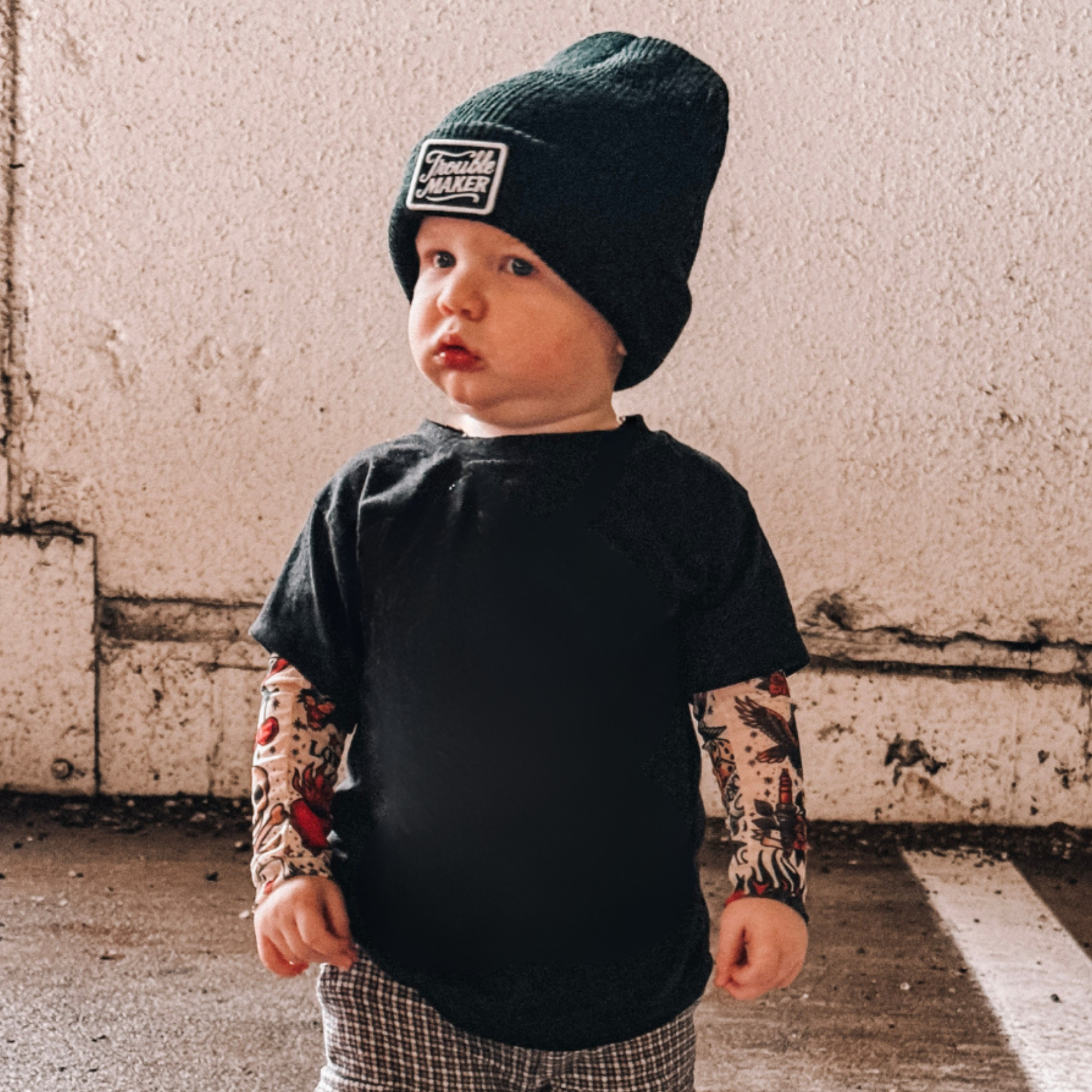 Knuckleheads infant and toddler arm sleeves featuring classic tattoo artwork