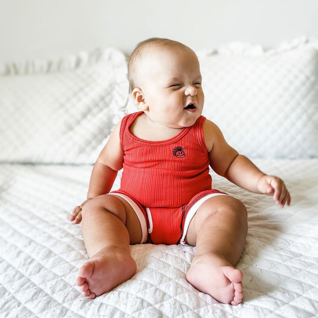 An image of Knuckleheads Logo Red Skivvies for Kids, showcasing stylish black underwear with the iconic Knuckleheads logo. These comfortable and trendy undergarments are perfect for children, combining fashion and comfort seamlessly.