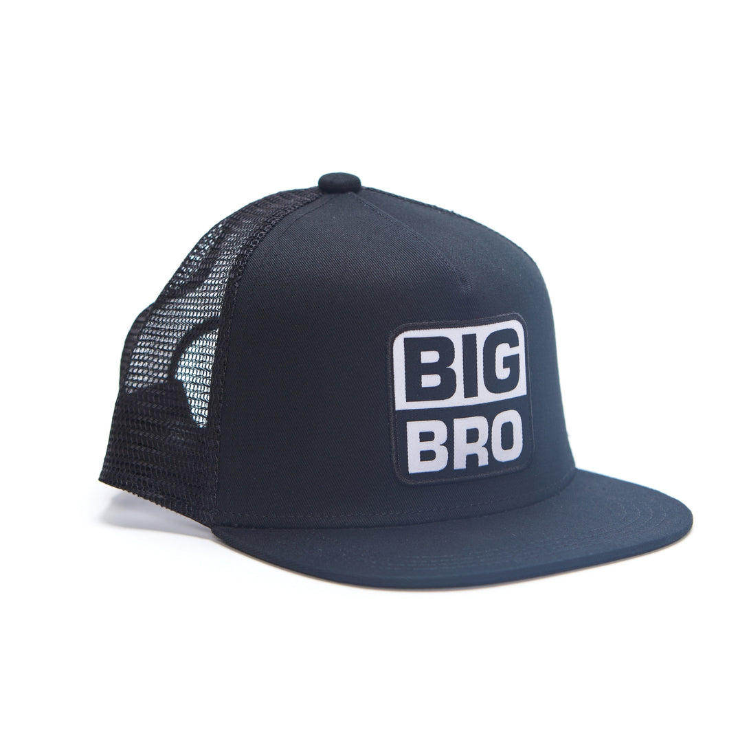 Image of Black Kids Trucker Hat with Sun Mesh and 'Big Bro' Patch: A cool and comfortable trucker hat designed for kids. The hat comes in sleek black with sun mesh for breathability, featuring an endearing 'Big Bro' patch on the front. Elevate your child's style with this trendy and heartwarming accessory, perfect for any adventure or everyday wear. Crafted with care, this black trucker hat with sun mesh and 'Big Bro' patch is a must-have addition to their wardrobe.