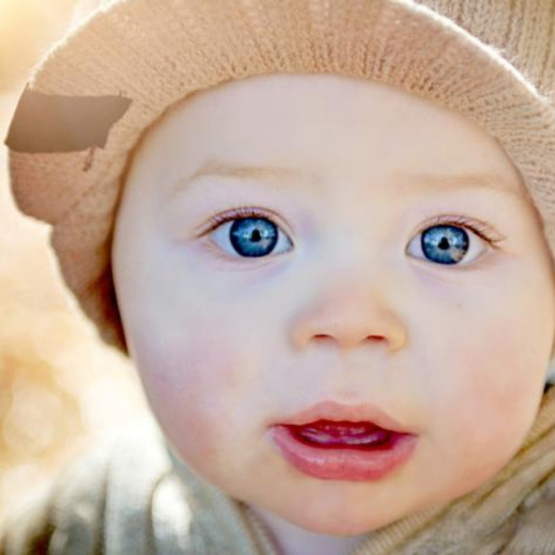 Image showcasing a tan beanie with a visor and Knuckleheads patch, designed for children. This versatile beanie combines practicality with style, featuring both a visor and the iconic Knuckleheads patch. Ideal for infants and toddlers, it stands out in the collection of Infant hats, offering a seamless blend of function and charm.