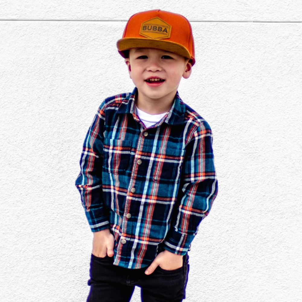 Image of Orange Kids Trucker Hat with 'Bubba' Patch: A vibrant and stylish accessory designed for kids. In a lively orange hue, it features a playful 'Bubba' patch on the front. Elevate your child's style with this fashionable hat, perfect for adding a pop of color to their outfits. Crafted with care, this orange kids trucker hat with the 'Bubba' patch is a must-have addition to their wardrobe, suitable for various occasions and everyday wear.